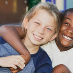 Two kids smiling